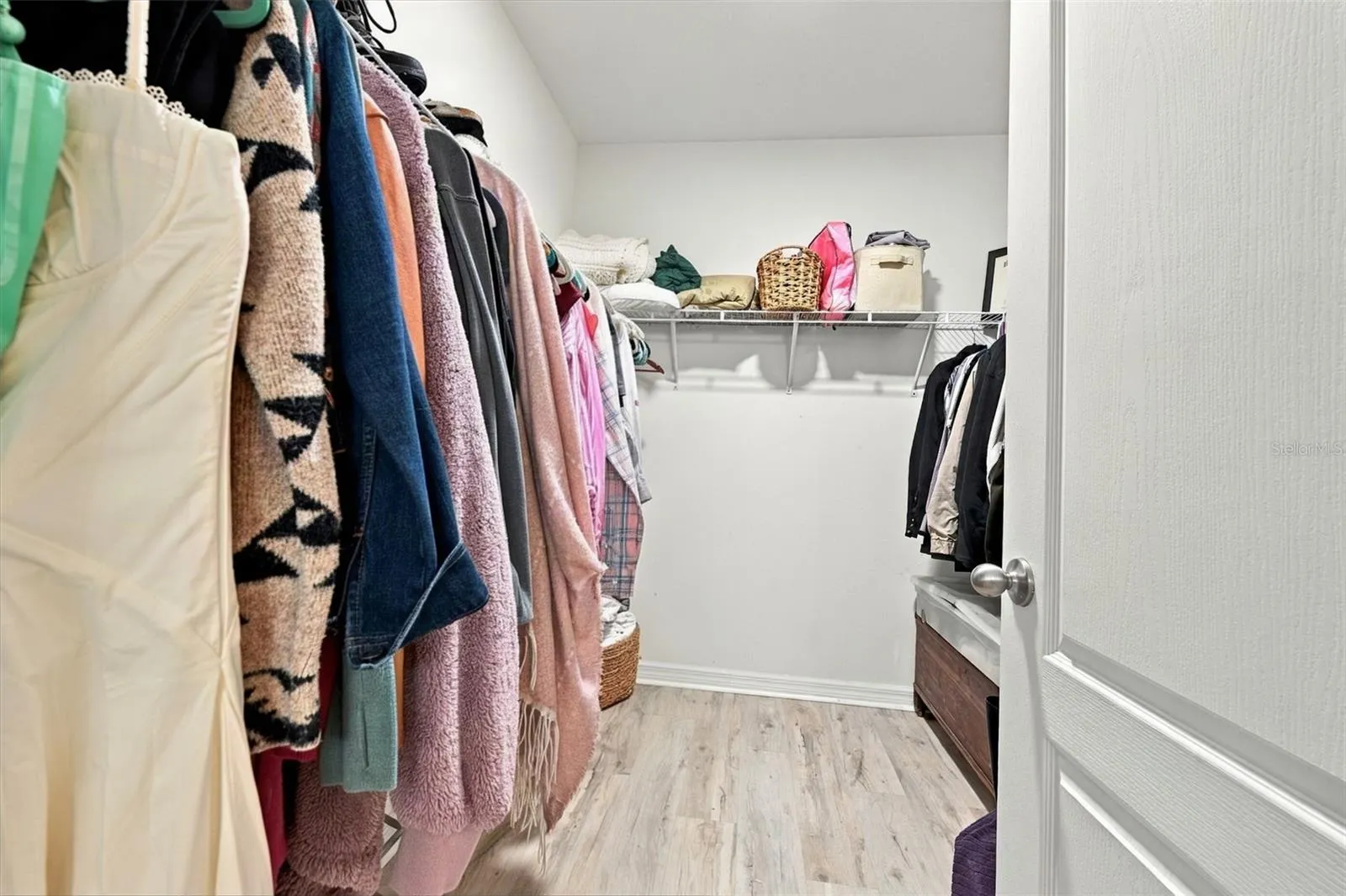 One of two primary bedroom closets