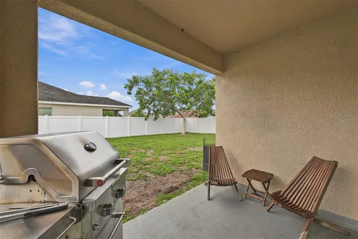 Covered lanai area with access from dining area sliding doors