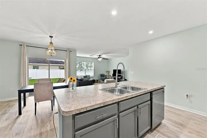Kitchen looking into dining/living room areas