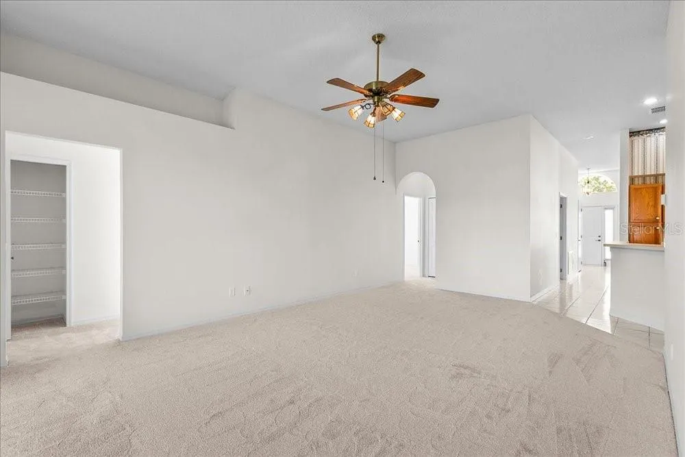 to left bedroom #2 & #3 and full bathroom. straight is bedroom #4 & 1/2 bath.