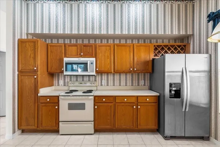 range, microwave and refrigerator