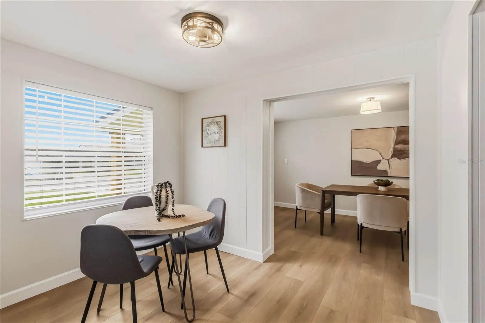 Breakfast nook spilling into Main Dining Room(there are many options this Breakfast nook could be used for).