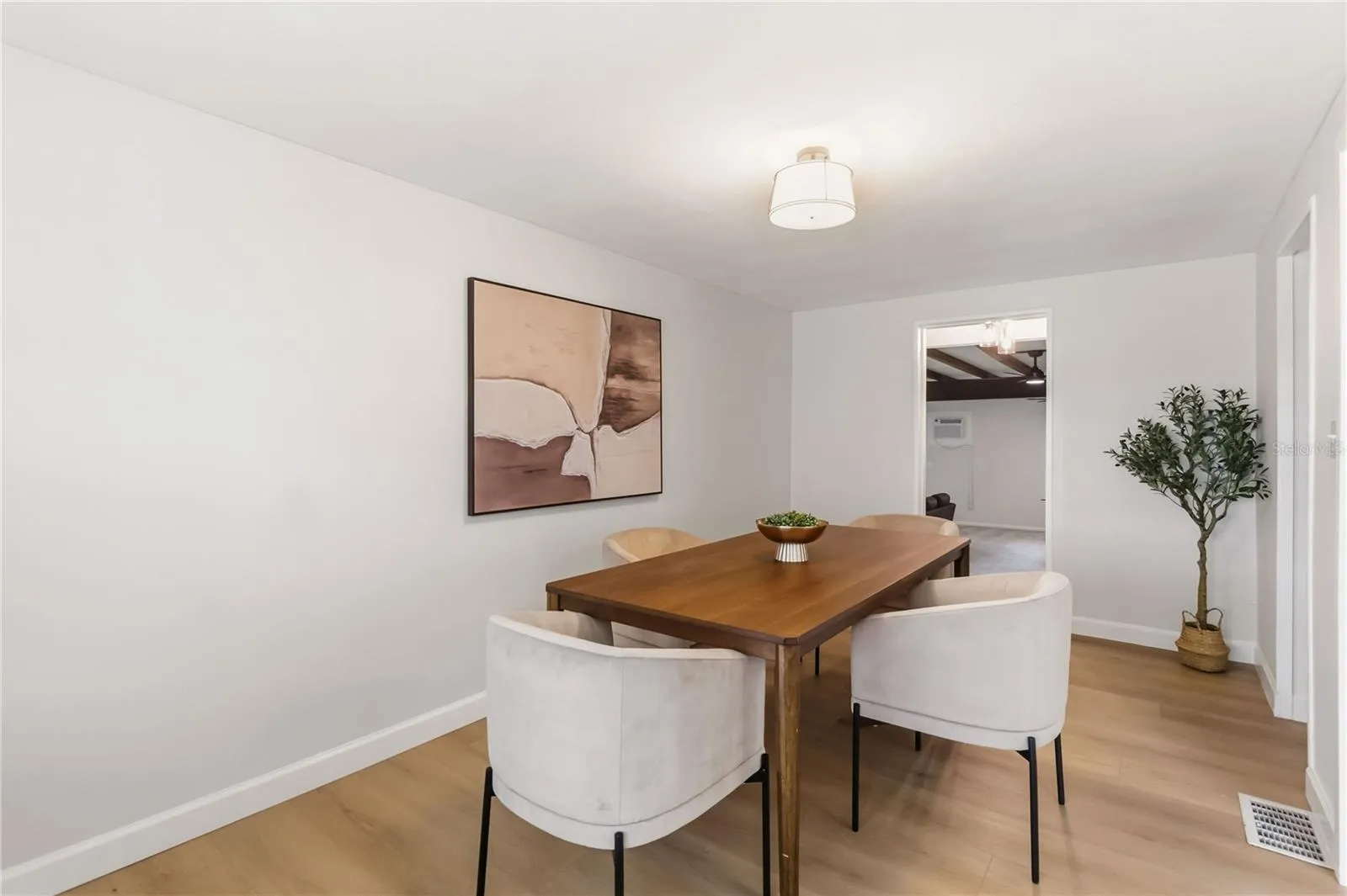 Dining room with steps down into the family/game room/Multi-Purpose