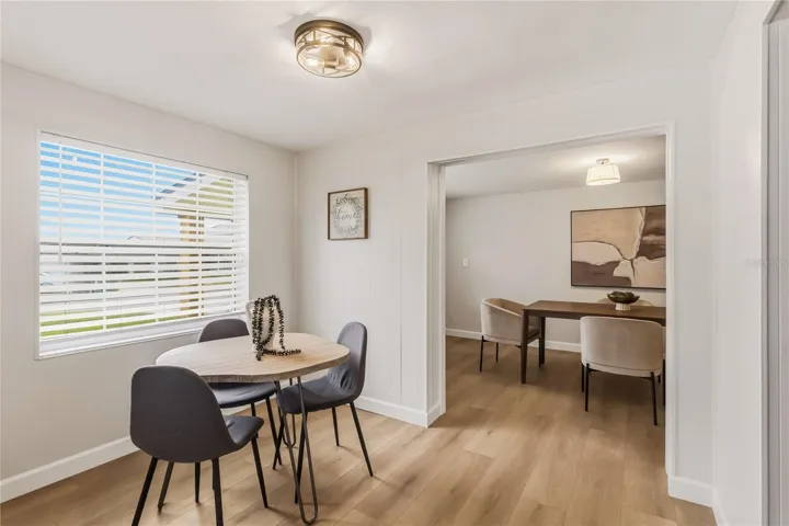 Breakfast nook spilling into Main Dining Room(there are many options this Breakfast nook could be used for).
