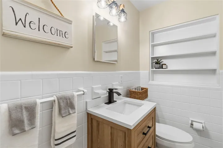 Main Bathroom with Tub and shower, large linen closet, New Vanity &amp; light fixture