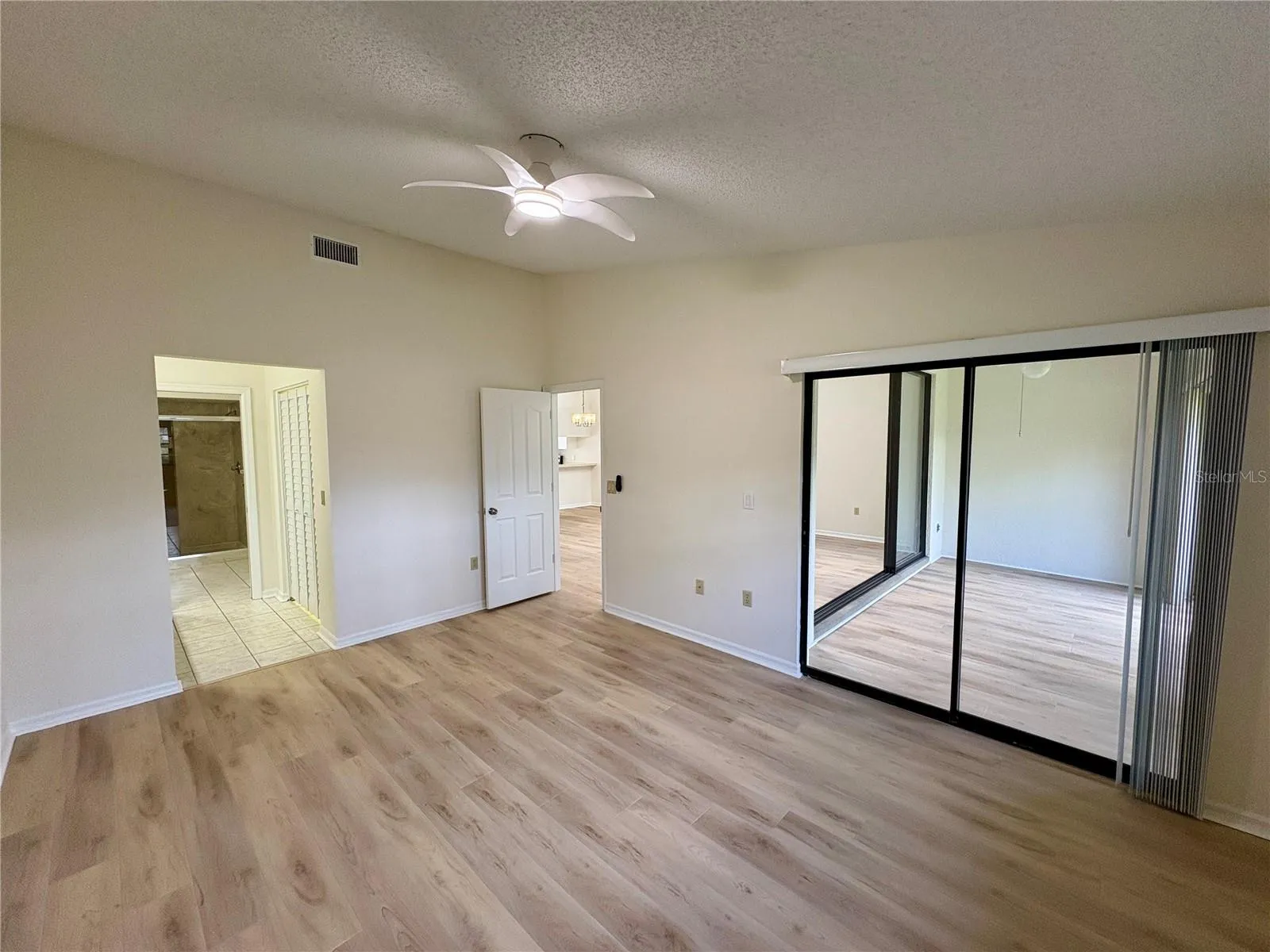Primary Bedroom slider vacant