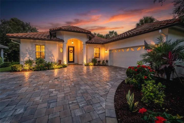 Dusk view of front of home