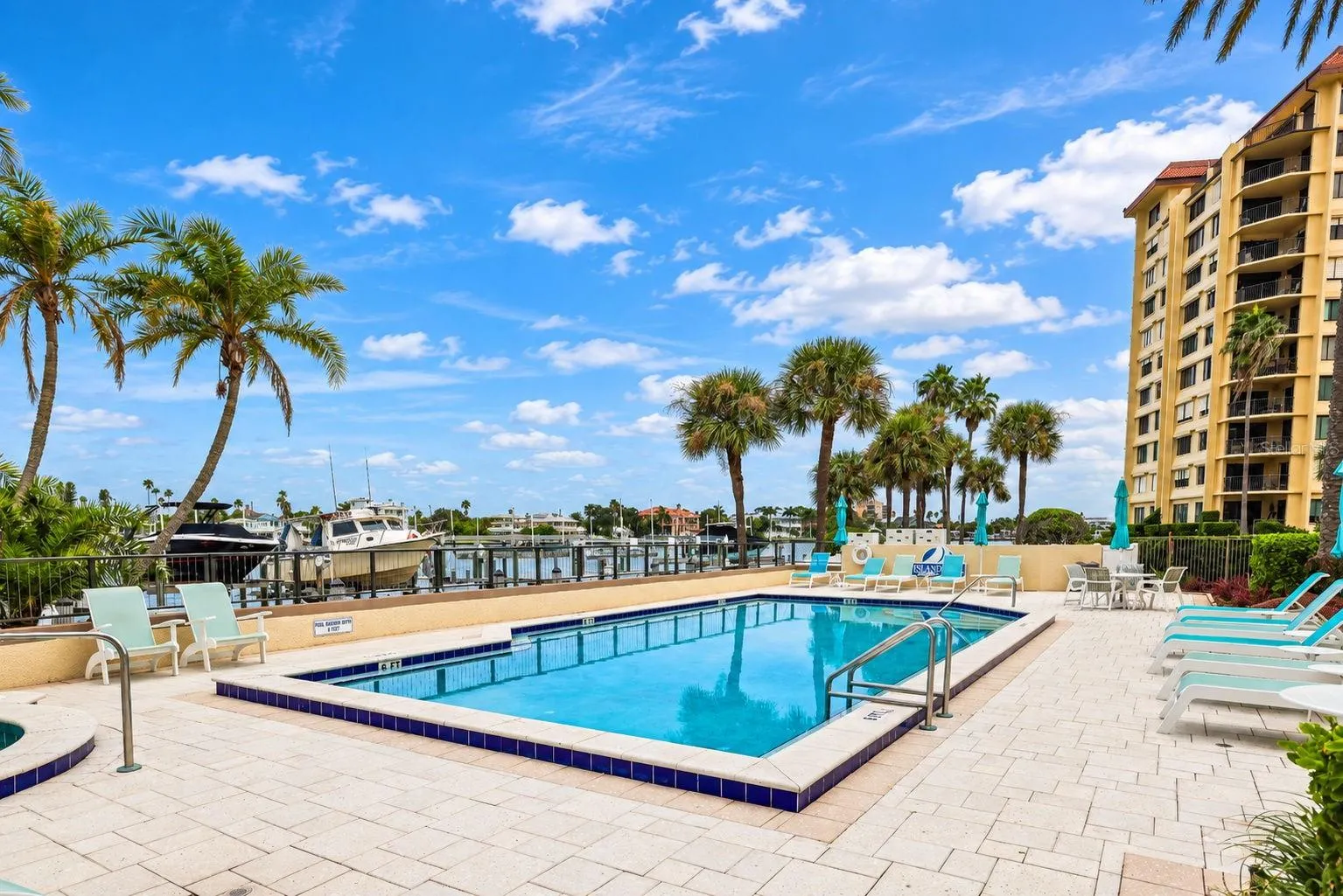 Heated pool sits literally next to the intercoastal