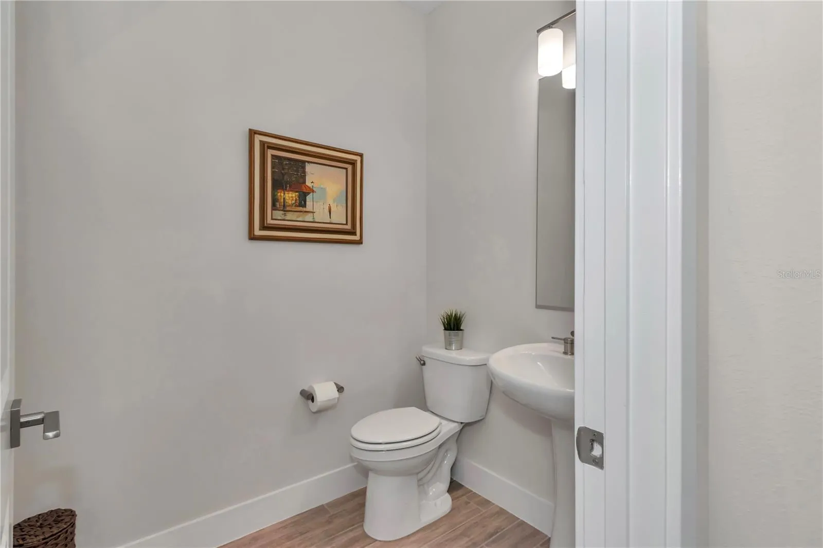 Half bath located off main foyer