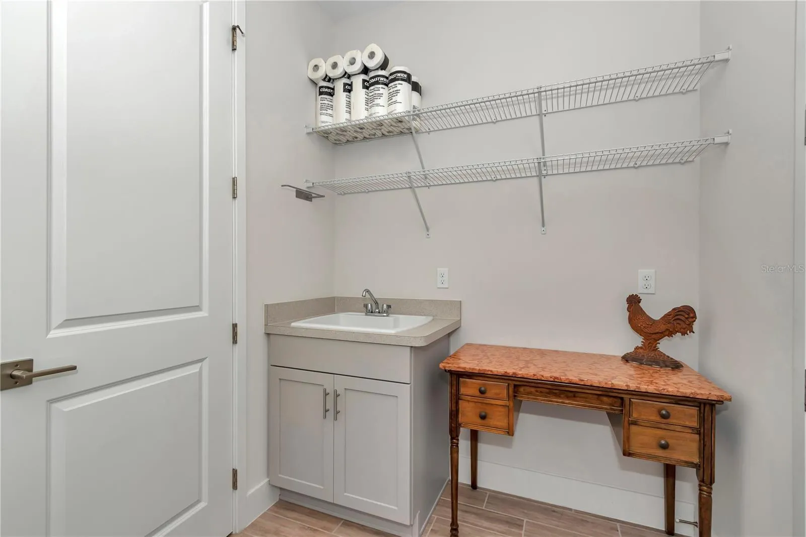 Extended Laundry room with sink and storage