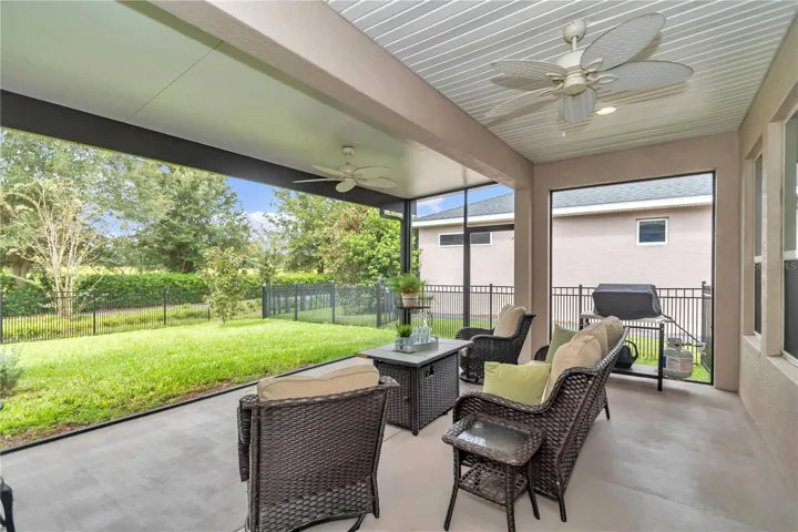 Extended and fully covered and screened lanai.