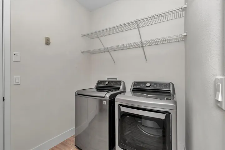 Extended laundry room with sink and storage