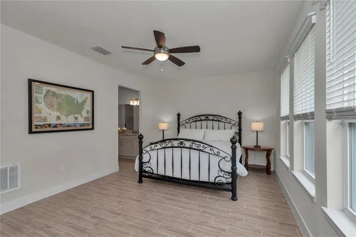 Large primary suite with garden views