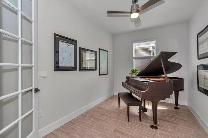 Awesome den or flex space.  Large enough for a baby grand piano.