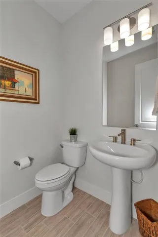 Half bath located off main foyer