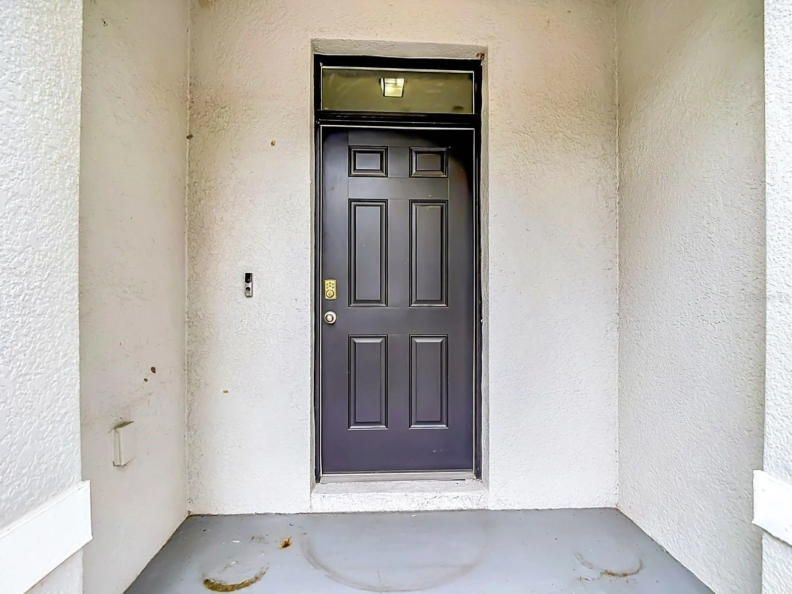 Covered entry with an electrical outlet for holiday decorations