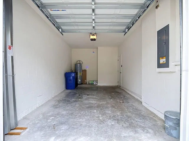 Hurricane panels are tucked inside the garage along with your trash and recycling cans