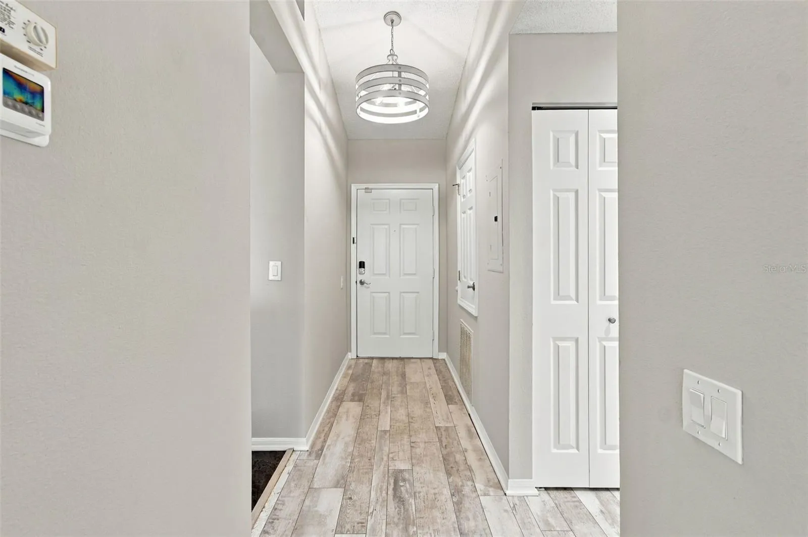 NICE FOYER AND STORAGE CLOSET ON RIGHT