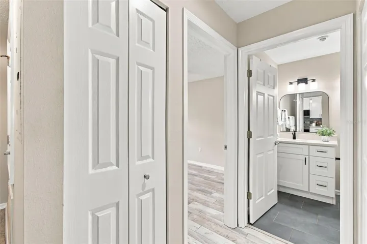 Guest Bath w Custom Vanity w/a Peek into Secondary Bedroom