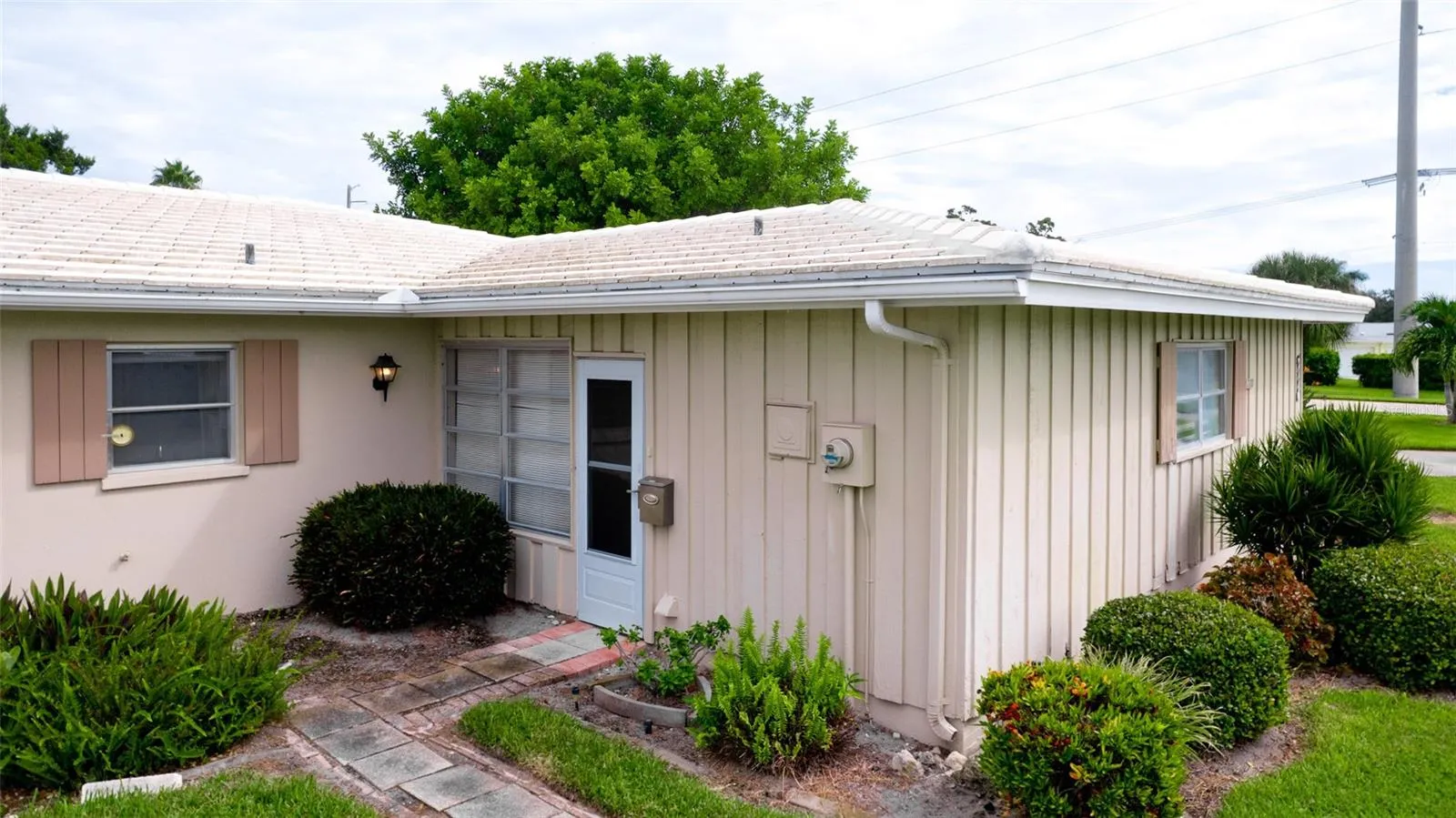 One of 2 front entrances besides the garage