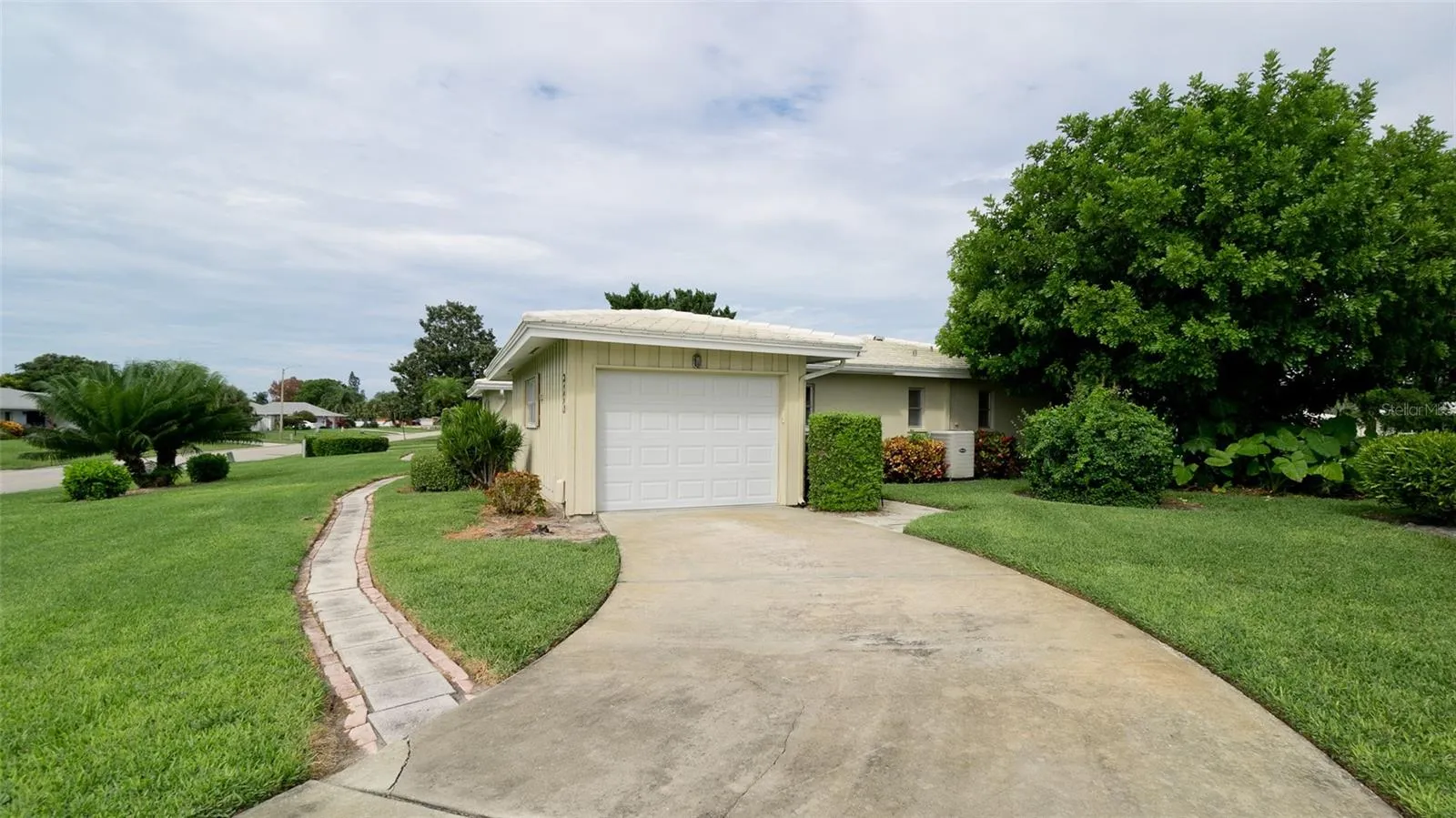 Long driveway leading to the garage