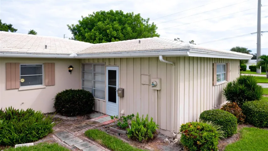 One of 2 front entrances besides the garage