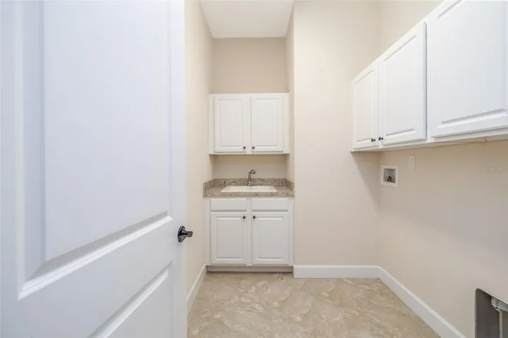 Laundry Room w Utility Sink &amp; Cabinets