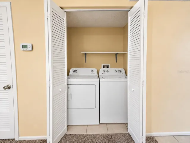 Laundry Closet with full size washer &amp; dryer