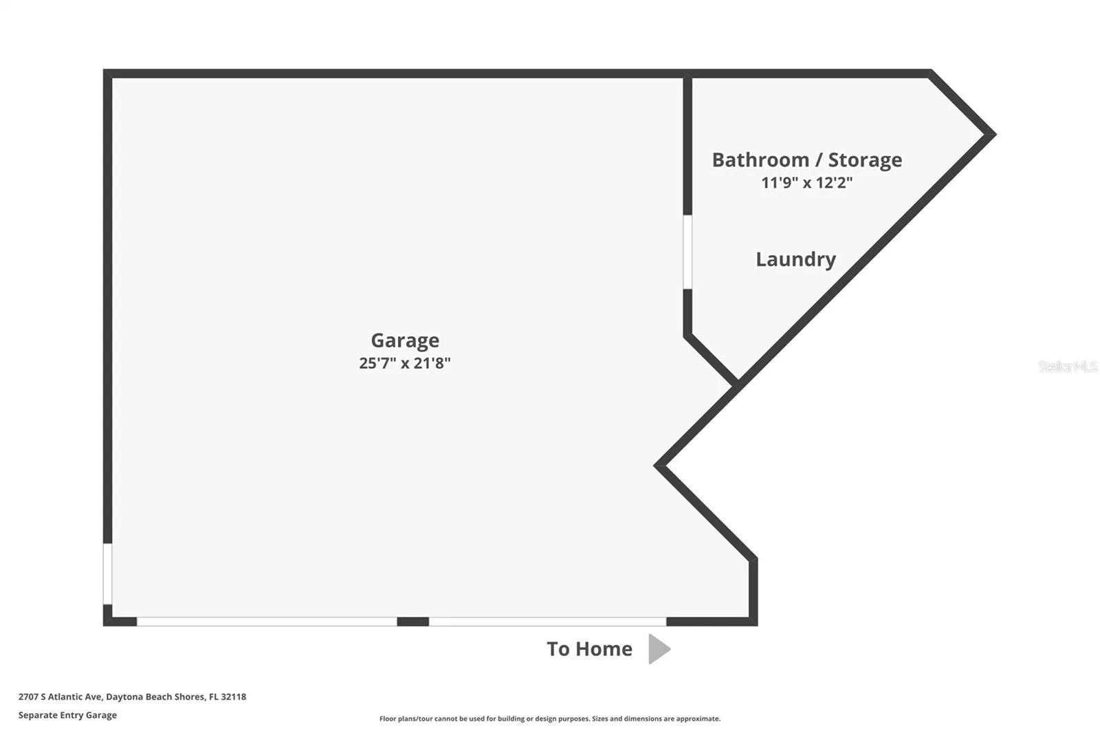 Lower level garage, half bath and storage with extra dryer.