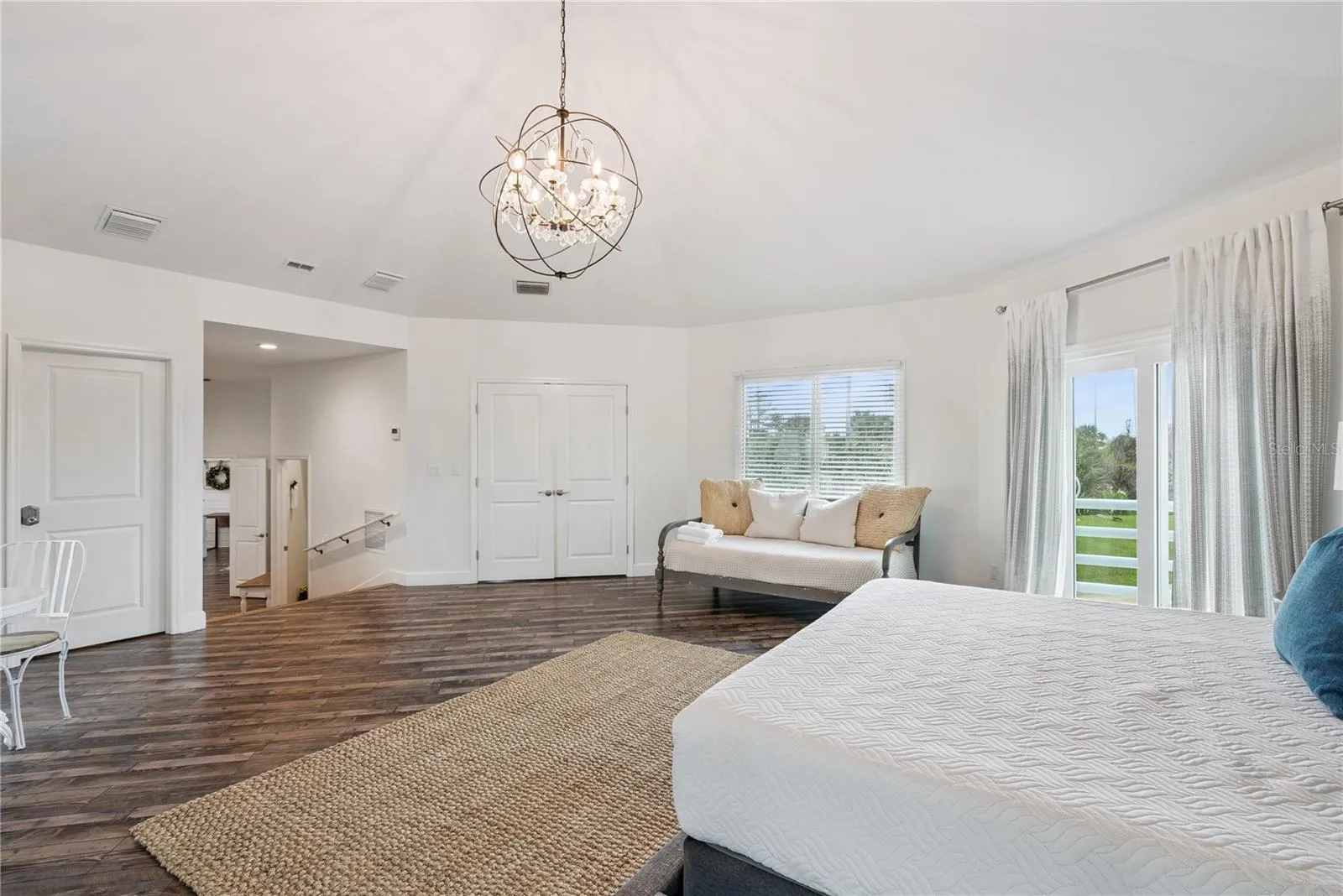 Primary suite: Spacious coastal retreat with ocean views, two large walk-in closets, and access to an oversized composite terrace overlooking the Atlantic