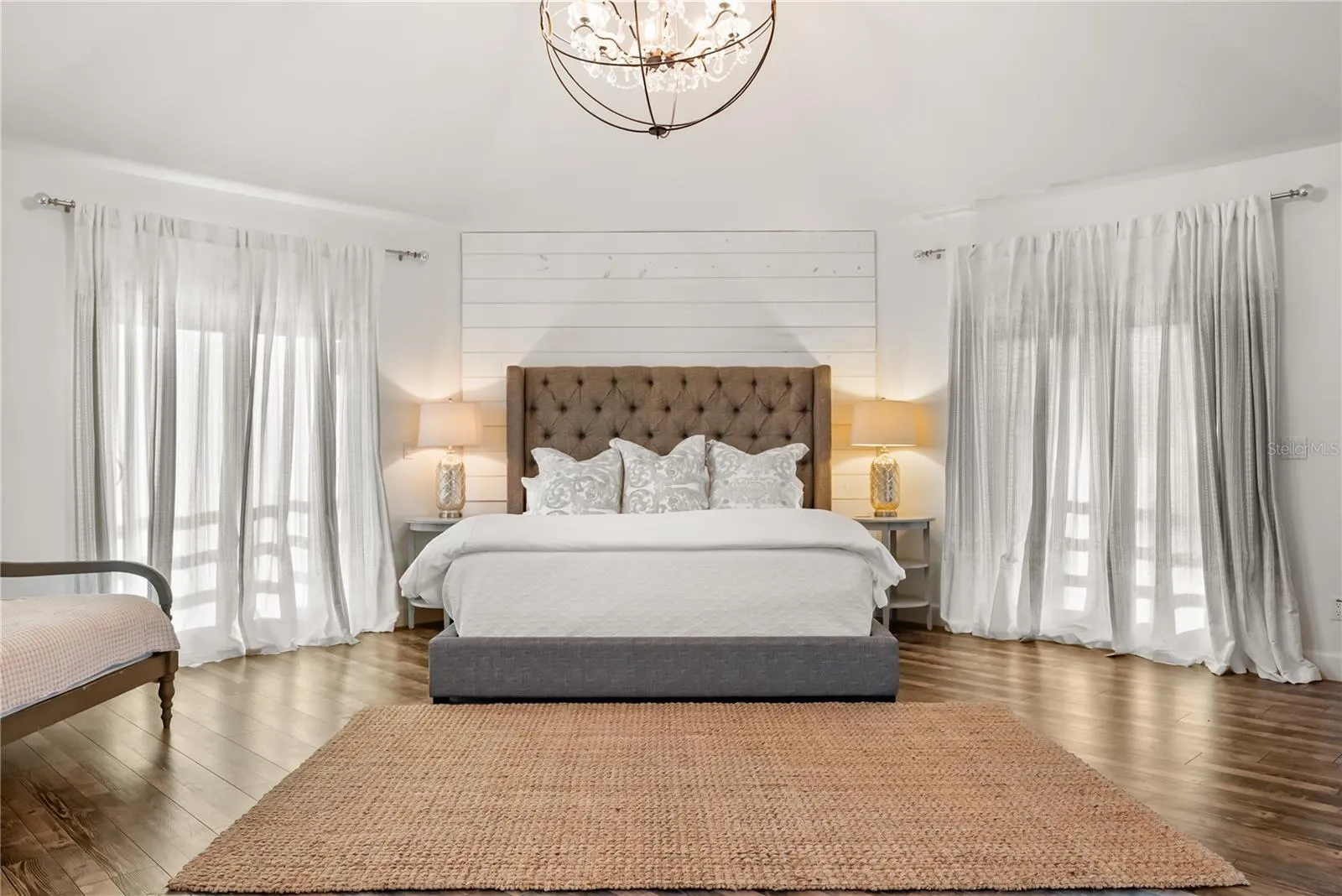 Primary suite: Spacious coastal retreat with ocean views, two large walk-in closets, and access to an oversized composite terrace overlooking the Atlantic