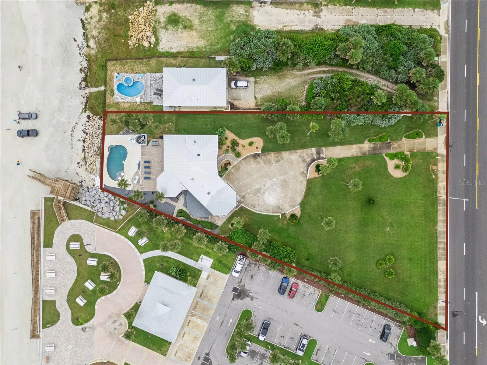 Set on over three-quarters of an acre with approximately 85 feet of ocean frontage, this property offers a generous setback from the road, ample driveway parking, and an attached garage. Neighboring Frank Rendon Park features a playground, covered picnic areas, restrooms, public beach access, and parking.