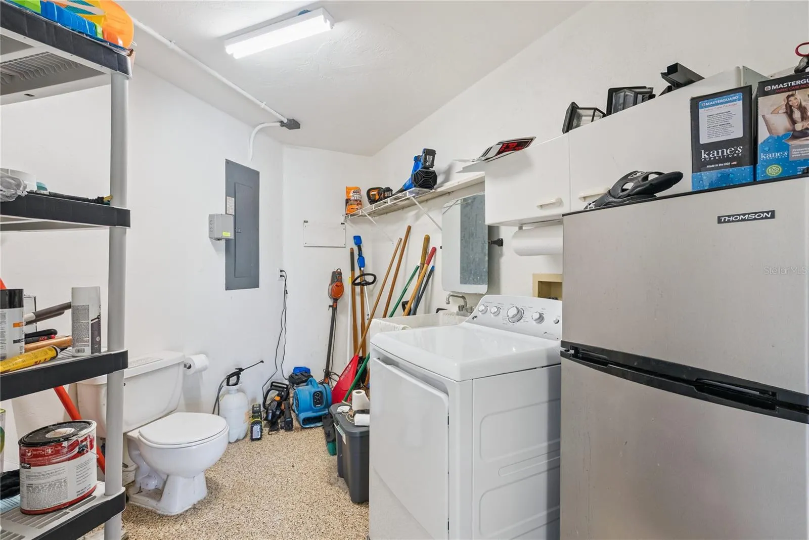Garage: Attached garage with an extra dryer and plentiful pool and beach toys