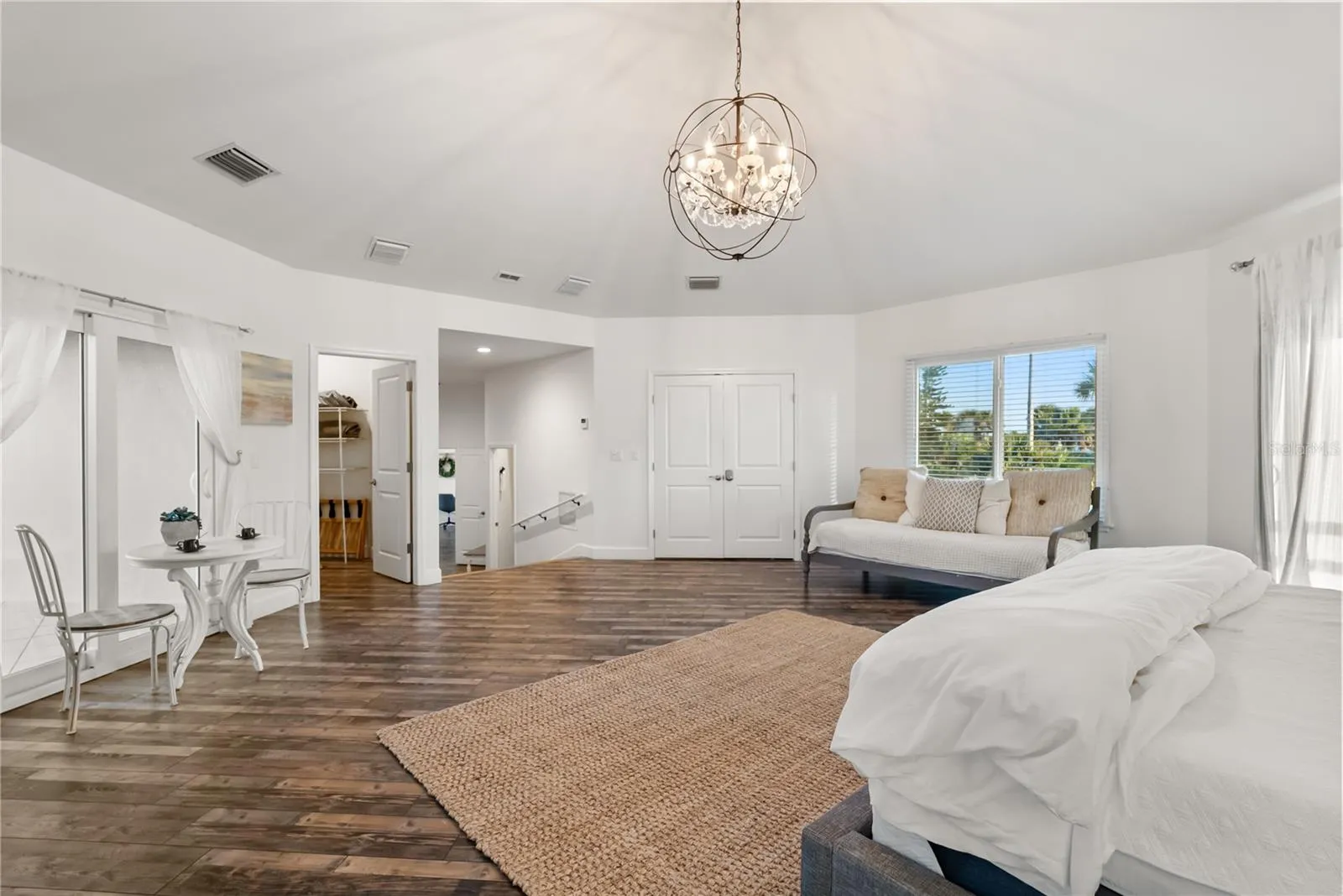 Primary suite: Spacious coastal retreat with ocean views, two large walk-in closets, and access to an oversized composite terrace overlooking the Atlantic