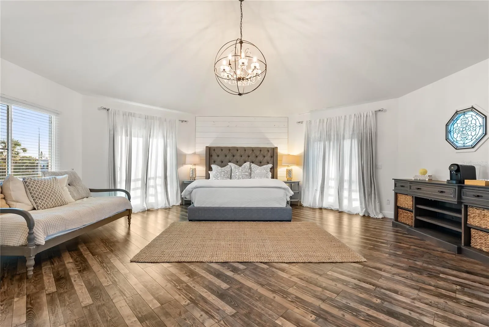 Primary suite: Spacious coastal retreat with ocean views, two large walk-in closets, and access to an oversized composite terrace overlooking the Atlantic