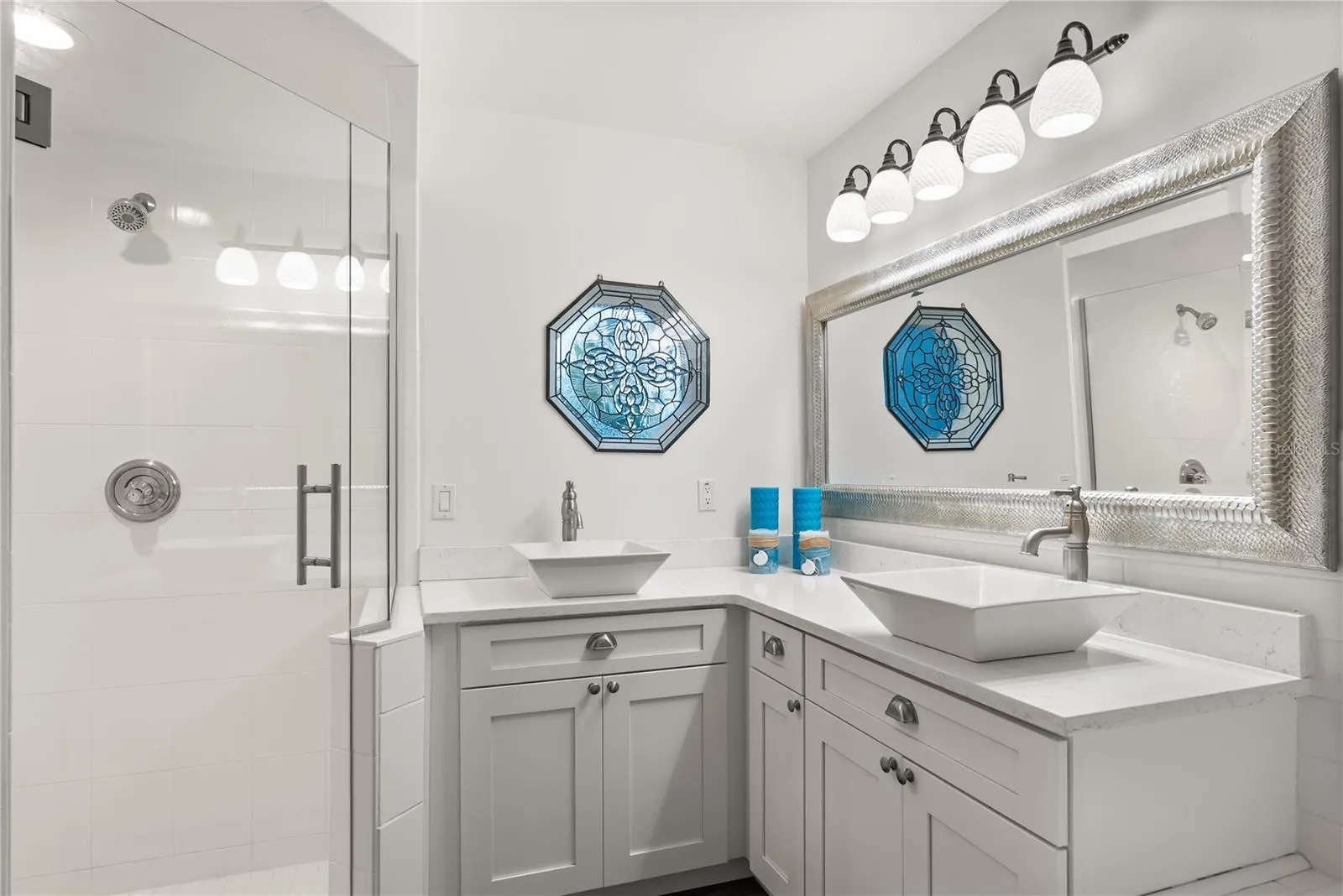 Master ensuite bathroom with updated finishes and statement window and skylight