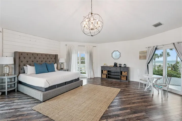 Primary suite: Spacious coastal retreat with ocean views, two large walk-in closets, and access to an oversized composite terrace overlooking the Atlantic