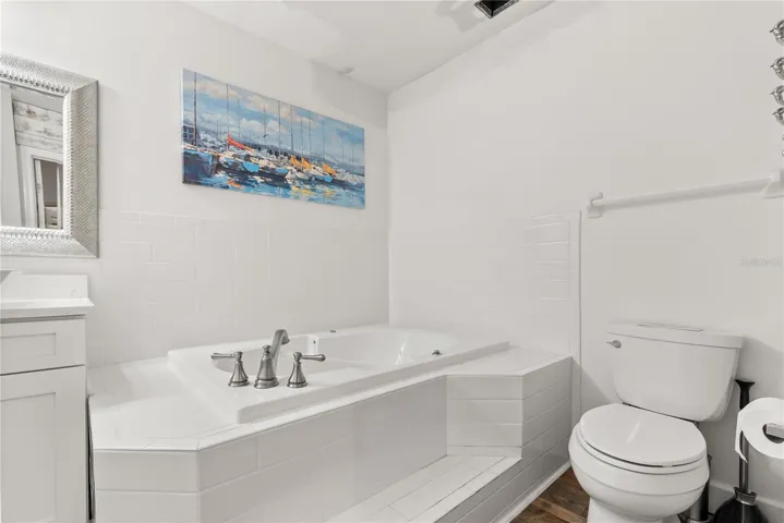 Master ensuite bathroom with updated finishes and statement window and skylight
