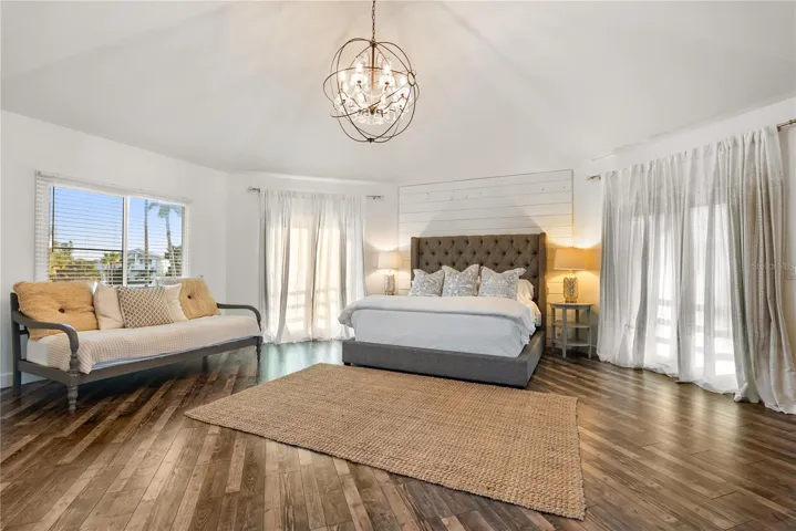 Primary suite: Spacious coastal retreat with ocean views, two large walk-in closets, and access to an oversized composite terrace overlooking the Atlantic