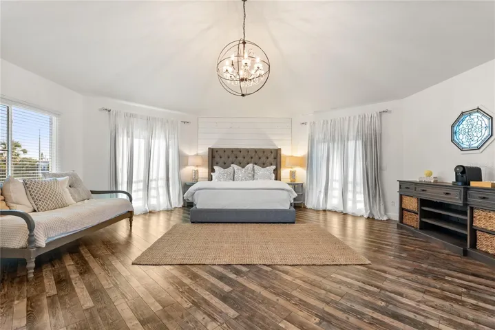 Primary suite: Spacious coastal retreat with ocean views, two large walk-in closets, and access to an oversized composite terrace overlooking the Atlantic