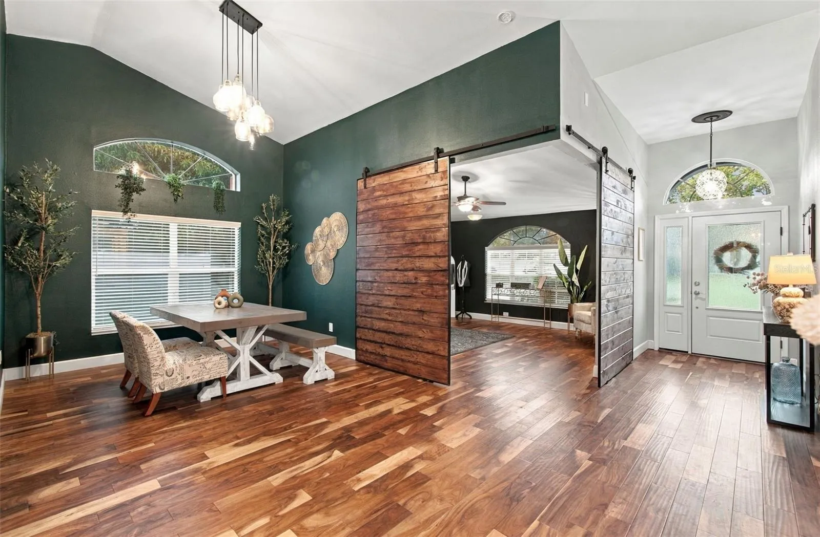 Formal living area leading into bonus room
