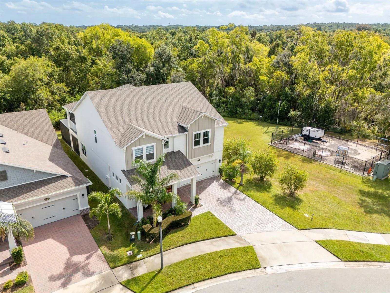 Aerial view showcasing conservation surroundings with no rear neighbors or neighboring home on the right.