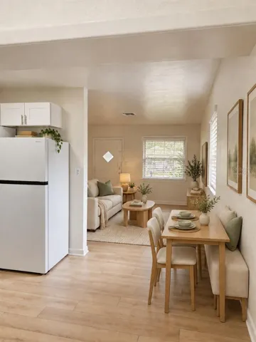 Virtually Staged Kitchen Eating Area and view of Living Room