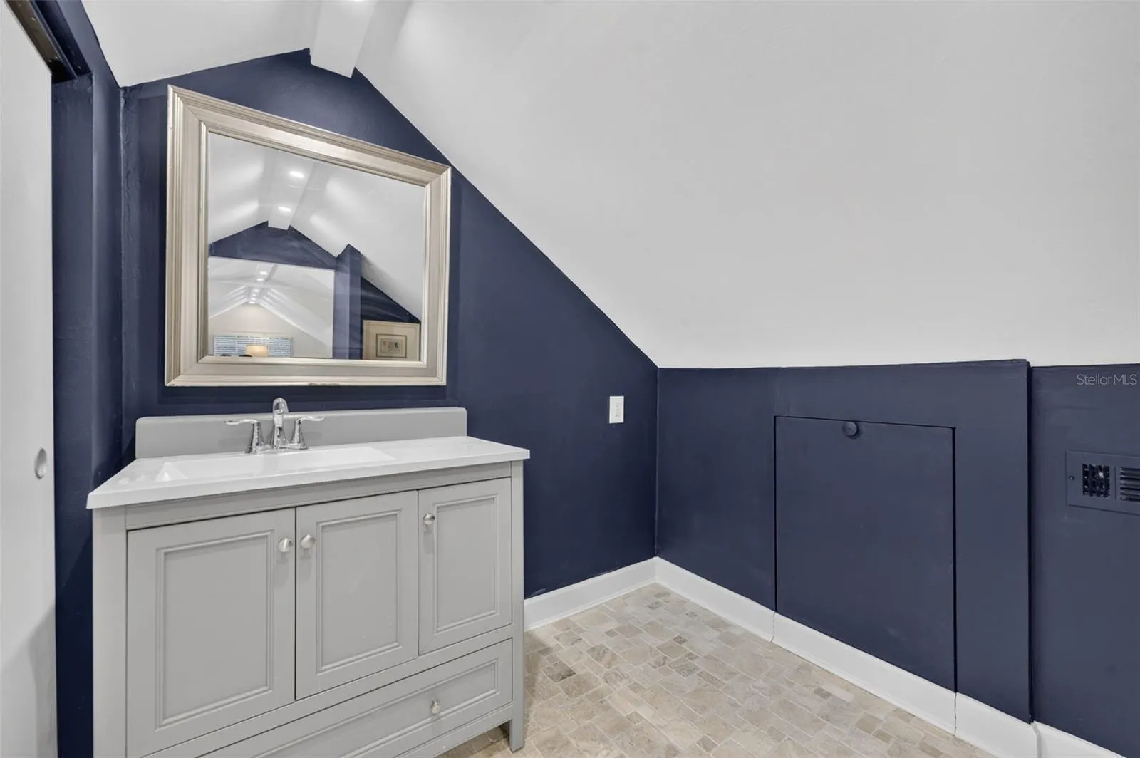 1/2 Bath Upstairs Large Storage Closet. Fully carpeted. Bath floor Travertine tile