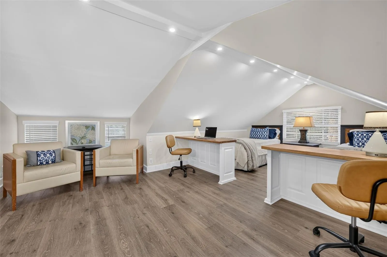 Sitting area and built in desks Loft area