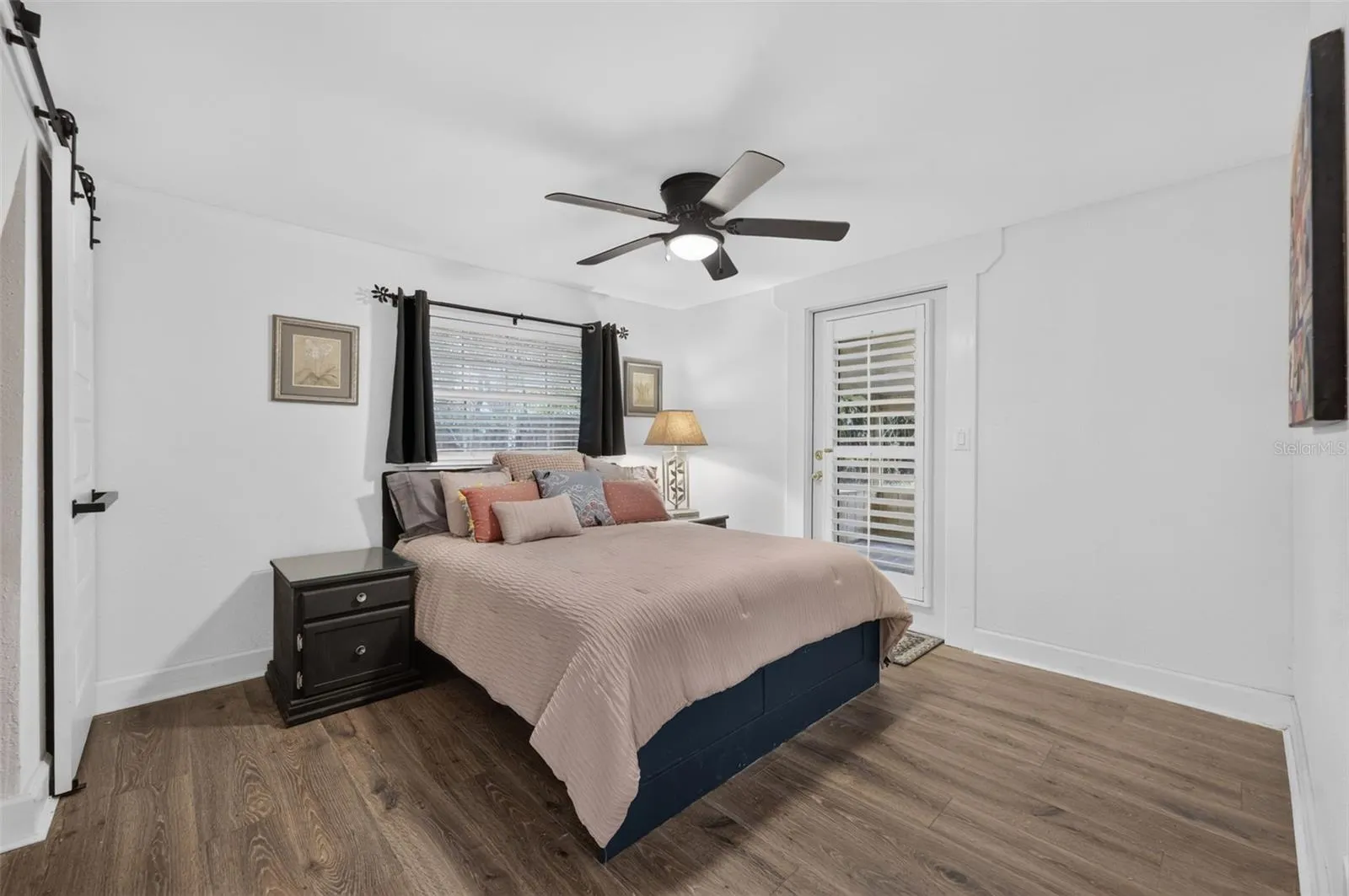 Bedroom 1. Attached screened porch