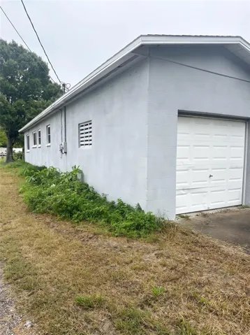 RIGHT SIDE OF HOME/GARAGE