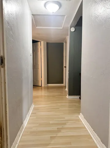 HALLWAY VIEW FROM PRIMARY BEDROOM