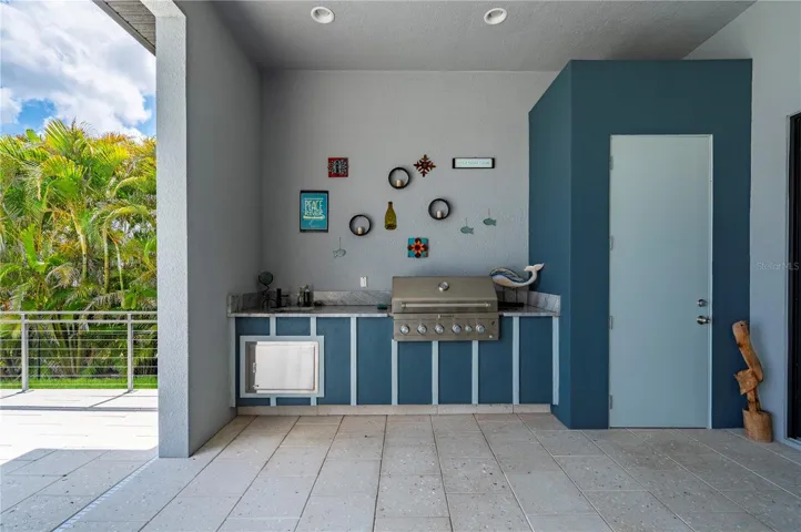 Outdoor kitchen and pool storage