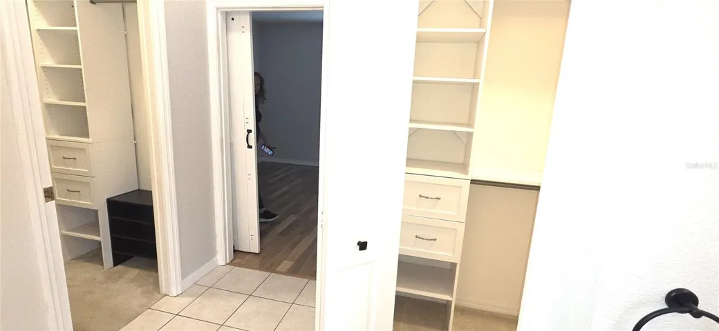 Primary Bedroom Walk-in Closets